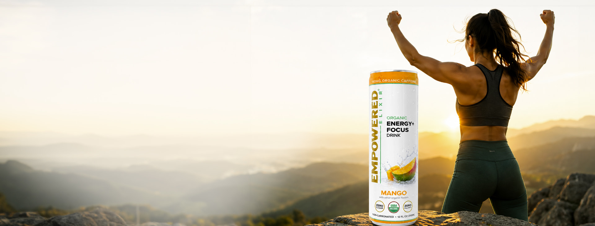 Empowered Elixir Mango can with athlete at sunrise